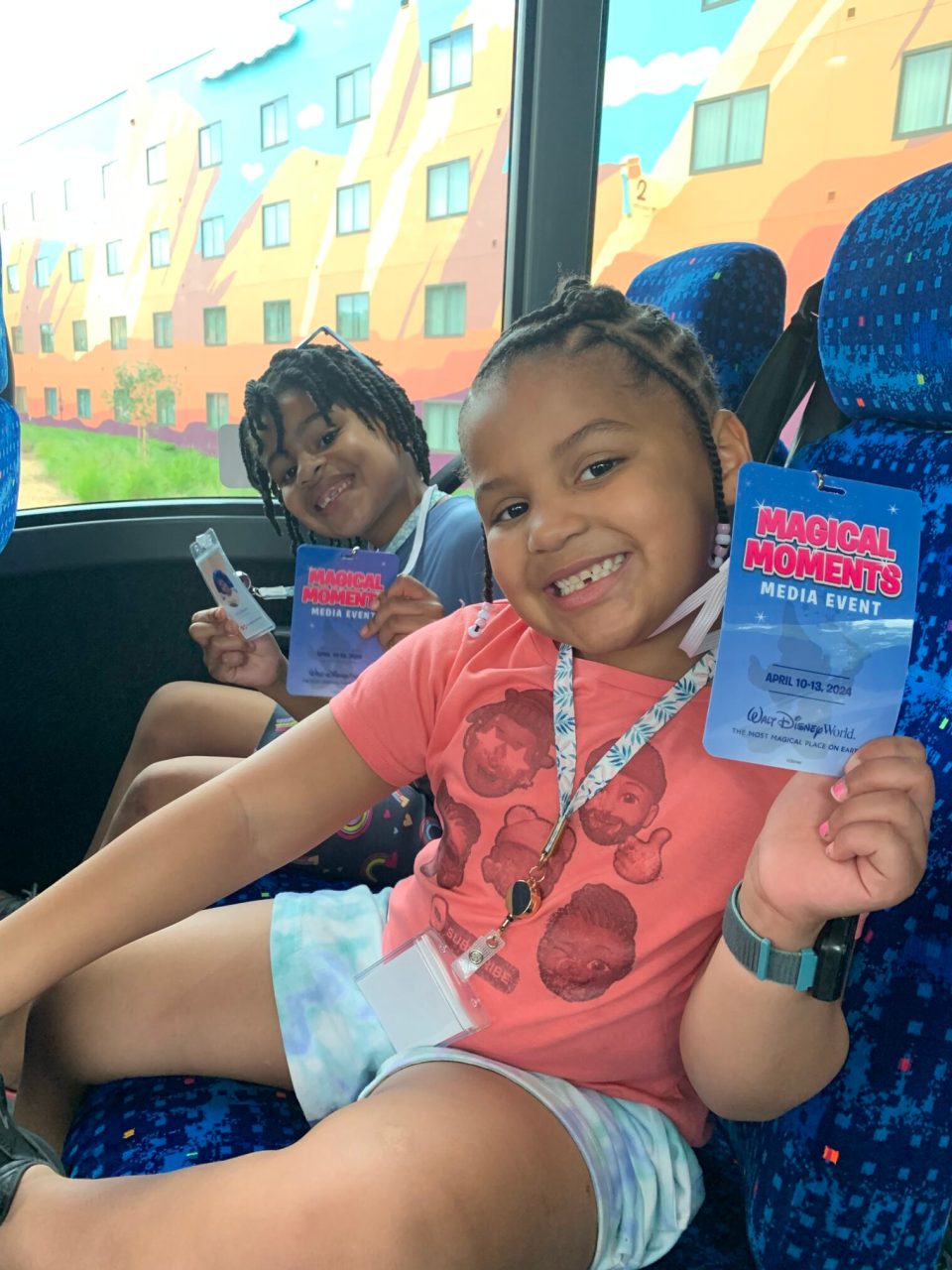 An auntie's guide to supporting kids' content creation dreams at disney world L to r: menzi and myla show off their media credentials and auntie-created press badge as the hit up disney for kids' content creation.