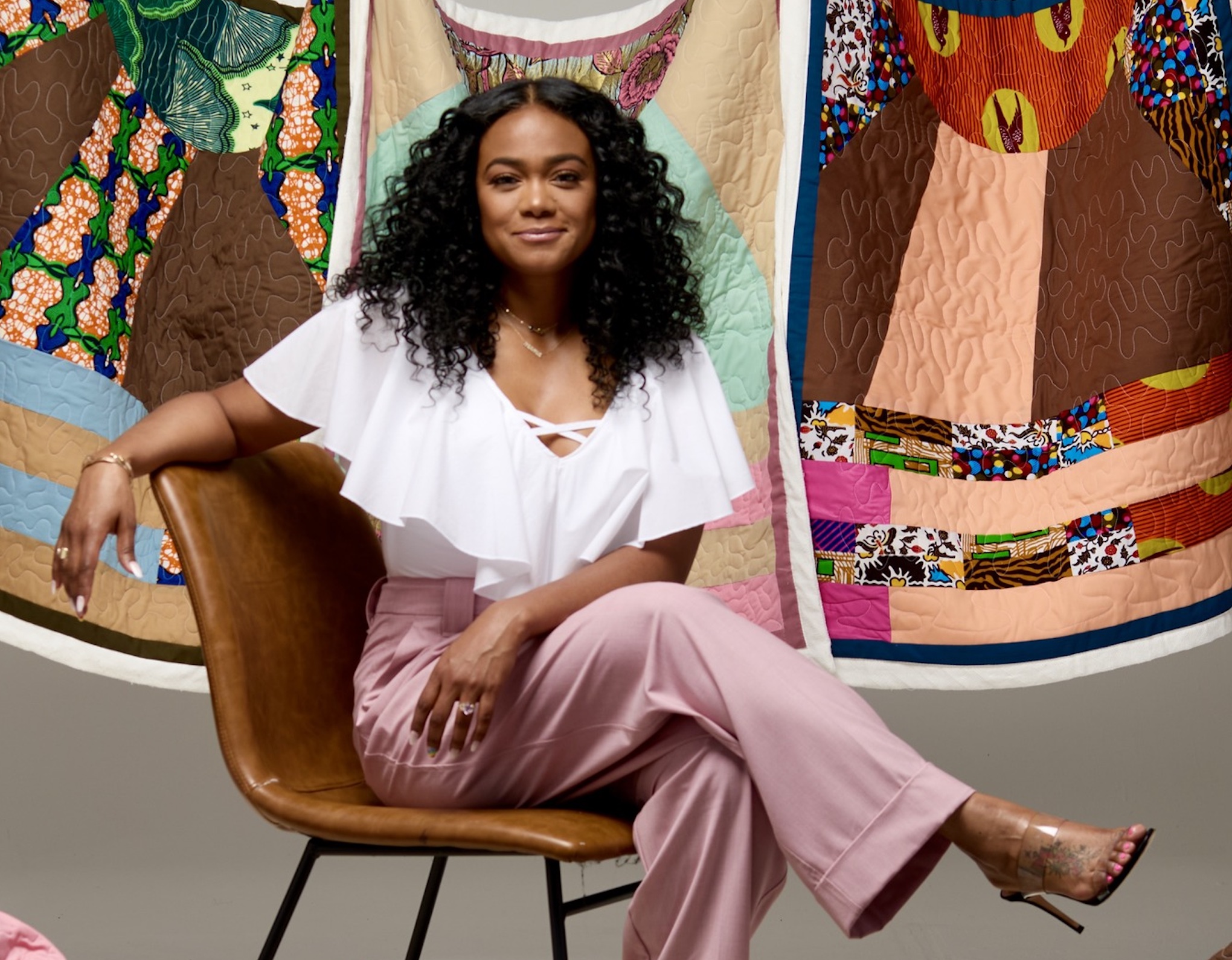 From fresh prince to baby yams: tatyana ali’s baby quilt brand empowering black mothers A cozy nursery setting displaying baby yams' unique baby quilts, made from 100% cotton and designed for warmth and comfort for from fresh prince to baby yams: tatyana ali’s baby quilt brand empowering black mothers