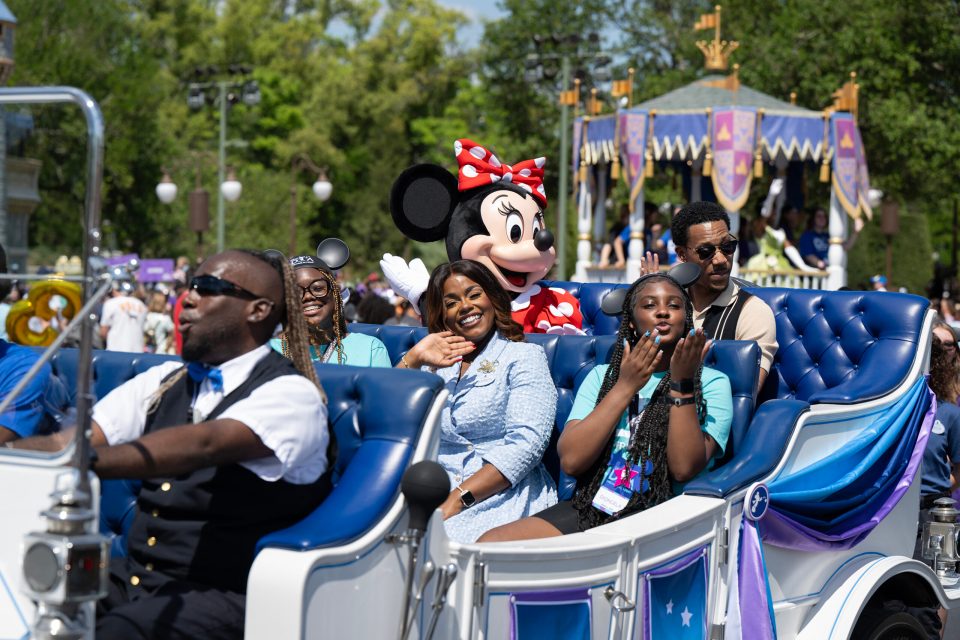 Grand marshal float scaled on successful black parenting magazine