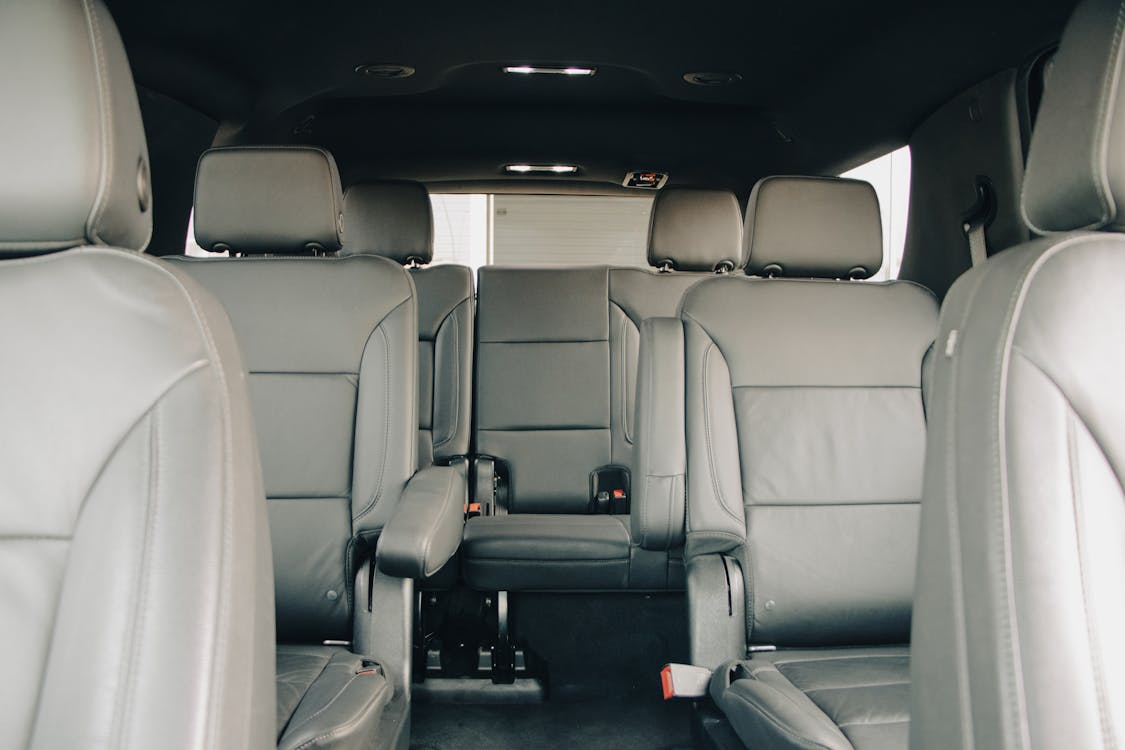 Inside of a large suv wiht grey leather interior - the 7 best airport car services in washington, dc