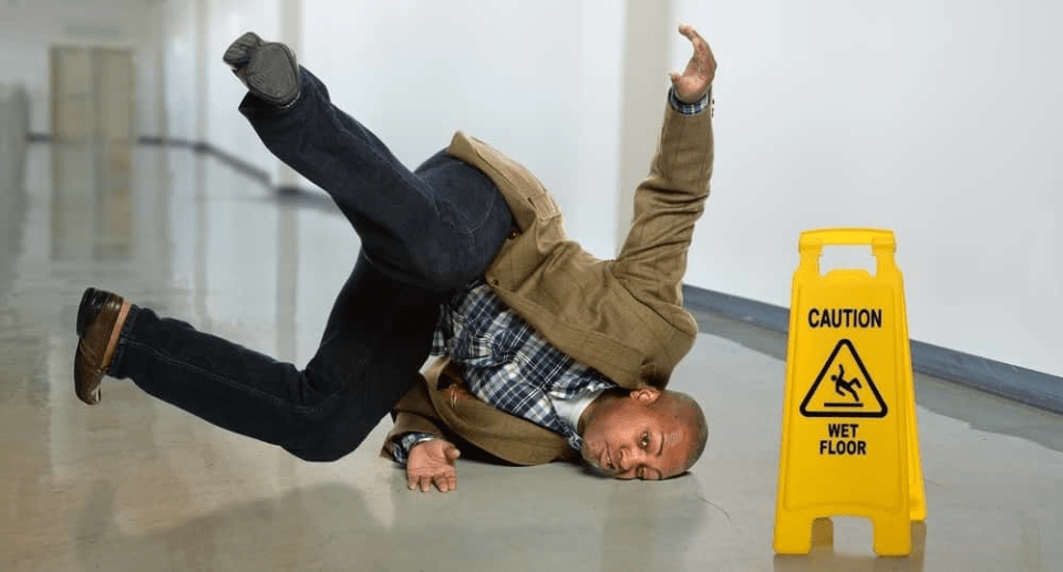 Man slipping on wet floor – slip and fall accident damages in los angeles.